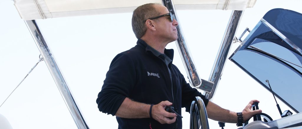 Below Deck Sailing Yacht's Captian Glenn Shepard at the helm.