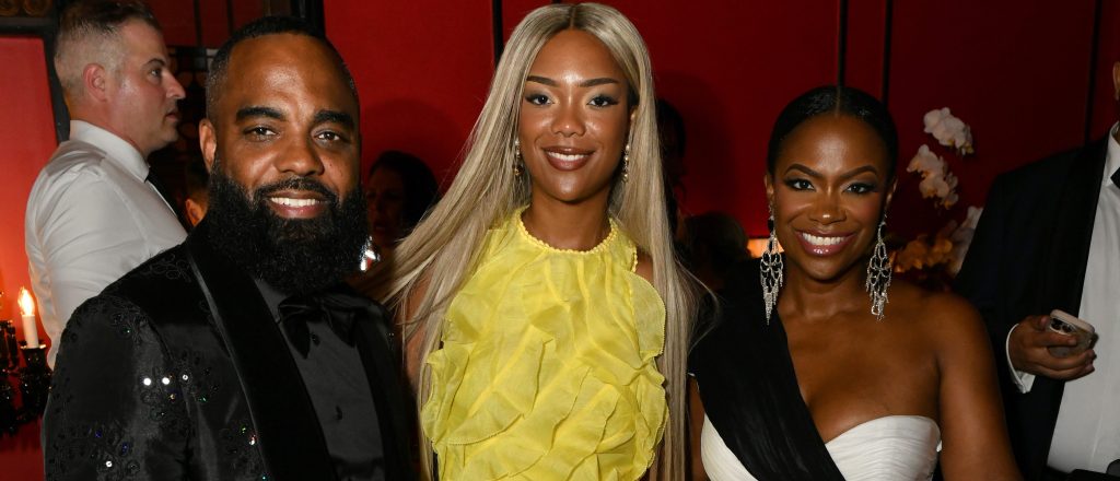 Riley Burruss with stepdad Todd Tucker and mom Kandi Burruss.