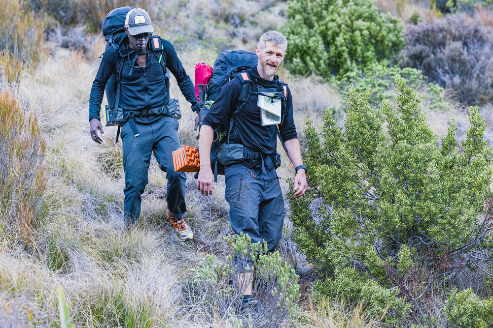 Coree and Jeff descending a mountain on Race to Survive: New Zealand