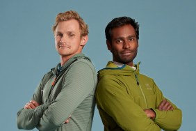 Oliver and Corry from Race to Survive: New Zealand standing with their backs up against each other