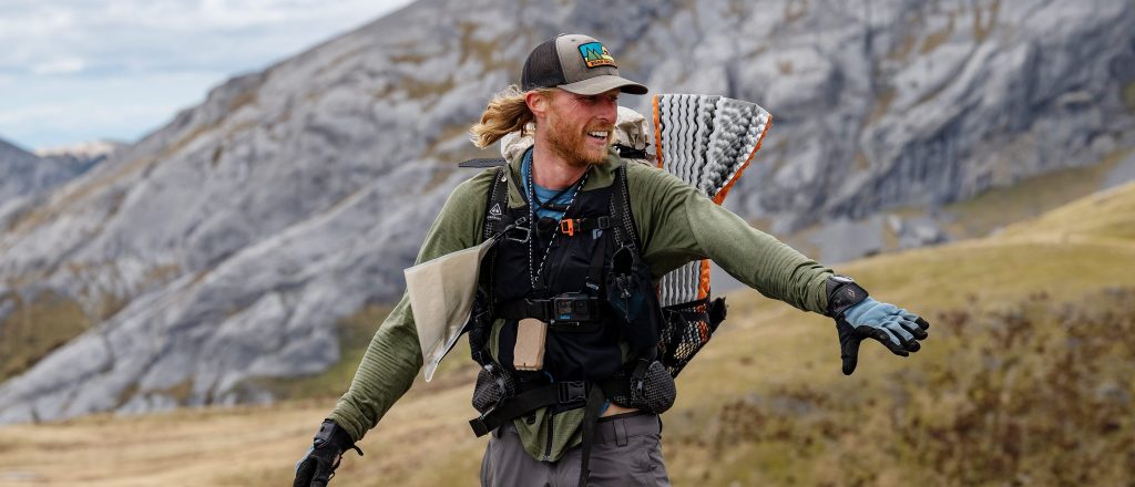 Creighton Baird with his arms stretched out on Race to Survive: New Zealand