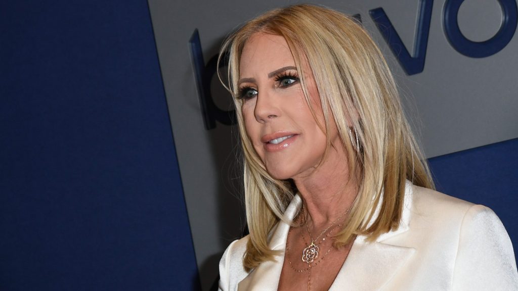 Fired Real Housewives of Orange County alum Vicki Gunvalson in a white suit.