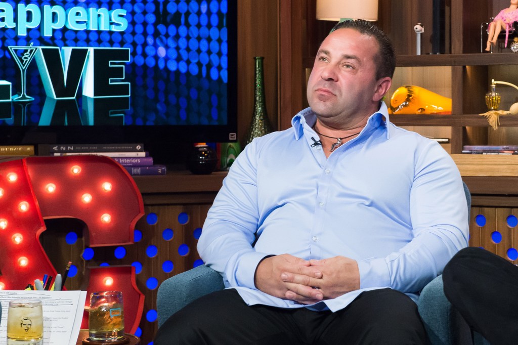 Joe Giudice in a blue shirt on WWHL.