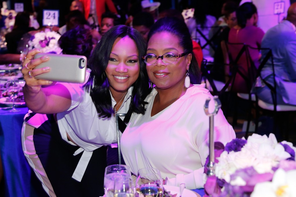 Garcelle Beauvais poses with Oprah Winfrey.