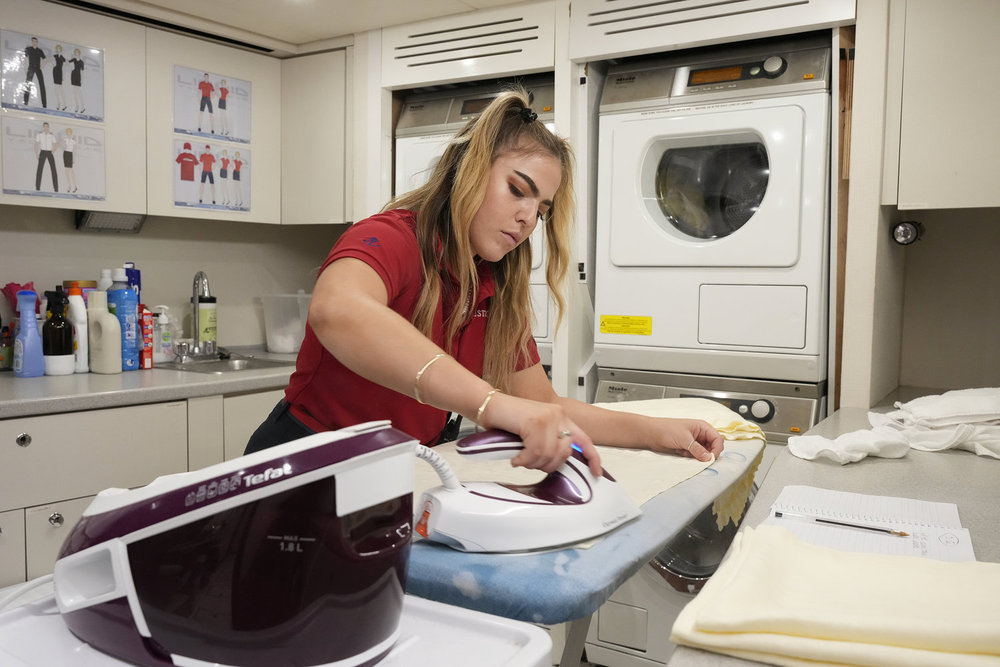 Bri Muller doing laundry on Below Deck Med.