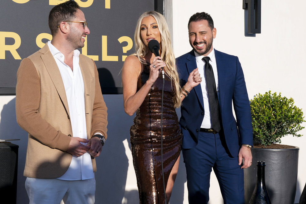 Matt Altman, Heather Altman and Josh Altman at an MDLLA event.