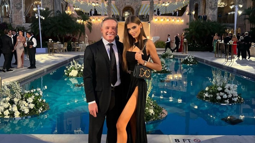 Dr. Lenny Hochstein and Katharina Mazepa in formal wear posing at Mar-a-Lago