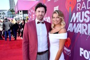 Beau Clark and wife Stassi Schroeder on the red carpet.