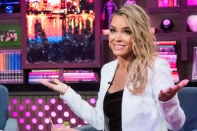 Teddi Mellencamp shrugging her shoulders and wearing a white blazer on Watch What Happens Live