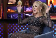 Tamra Judge holding her arms in the air and waving them like she just doesn't care on WWHL.