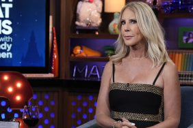 Vicki Gunvalson sitting with her hands folded in her lap on WWHL.