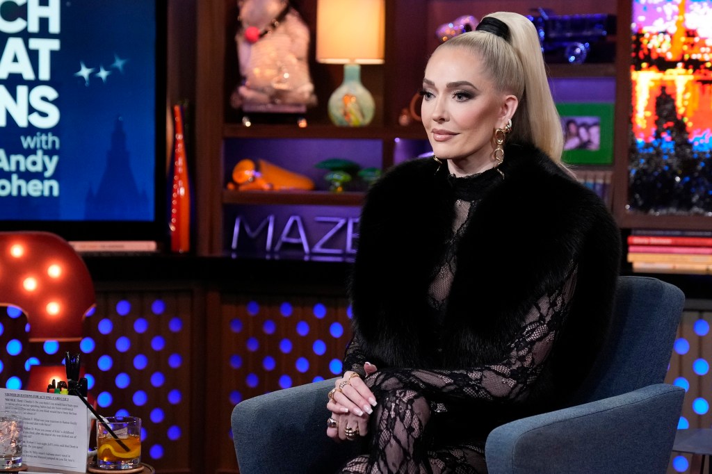 Erika Jayne wearing black and looking serious on WWHL.