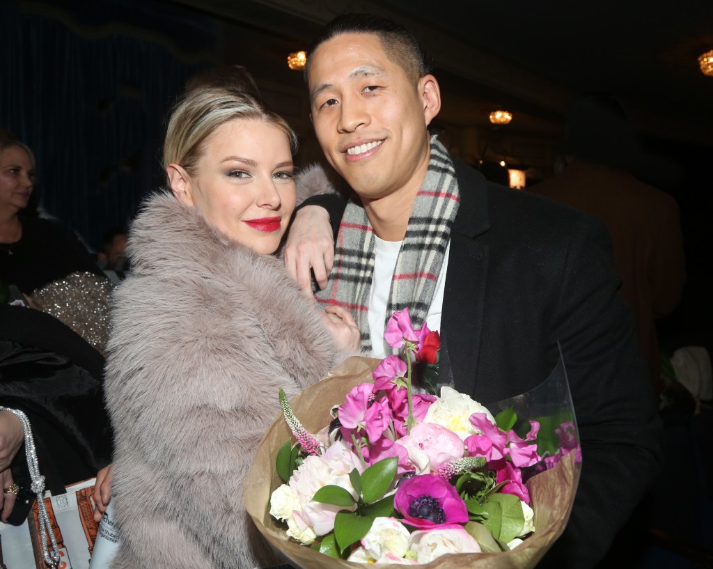 Ariana Madix and Daniel Wai holding a bouquet of flowers