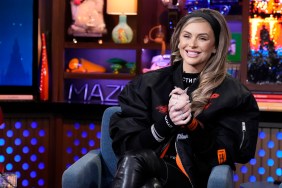 Lala Kent smiling and clasping her hands on WWHL.