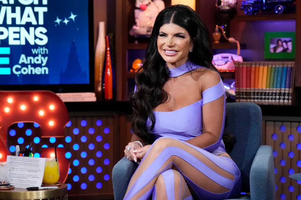 Teresa Giudice in a purple body suit on WWHL.