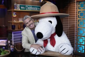 Andy Cohen loving up on Snoopy - but not for dinner.