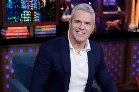 Andy Cohen smiling into the camera in the WWHL clubhouse.