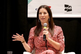 RHONY's Rebecca Minkoff speaking on a panel.