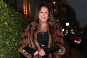 Fran Cutler walking in a fur coat