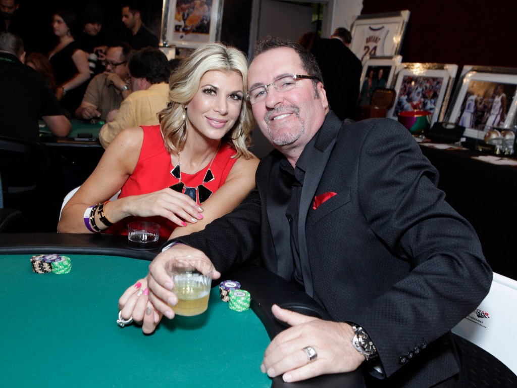 Jim Bellino and Alexis Bellino sitting at a poker table