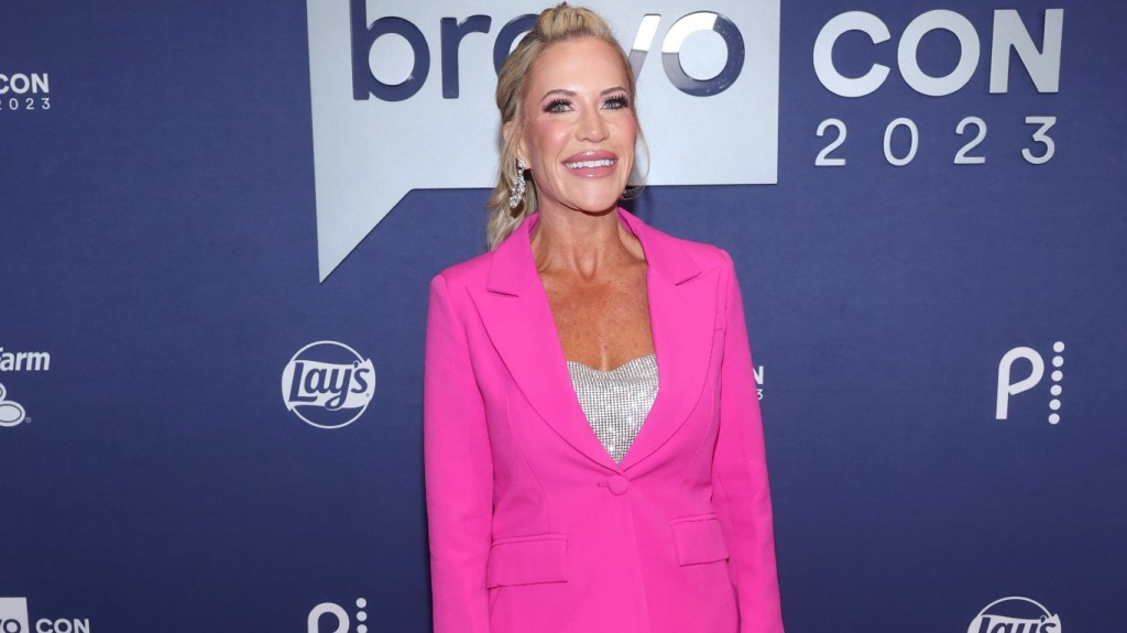 Jennifer Pedranti in a pink suit at Bravocon 2023