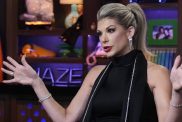 RHOC star Alexis Bellino with her hands in the air on WWHL.