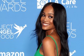 Rachel Lindsay in a green dress doing an over the shoulder pose