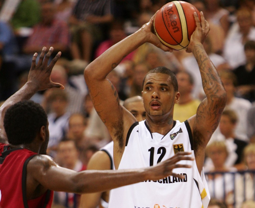 Julian Sensley playing basketball.