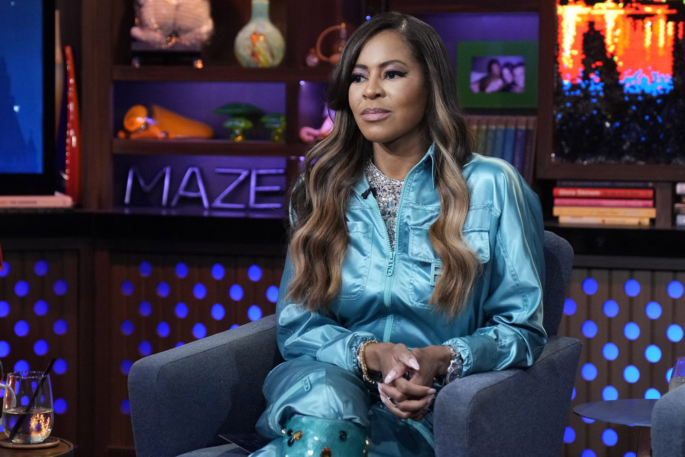 Mary Cosby in a blue satin outfit on WWHL. 