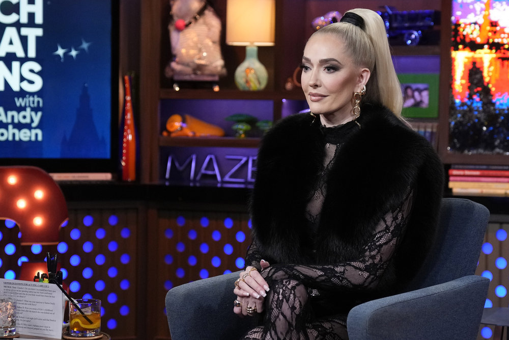 RHOBH star Erika Jayne wearing black lace and fur on WWHL. 