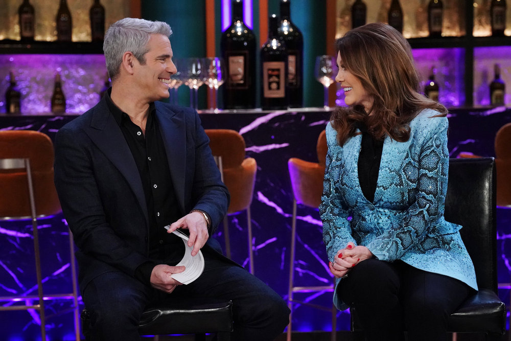 Andy Cohen and Lisa Vanderpump filming a Vanderpump Rules reunion. 