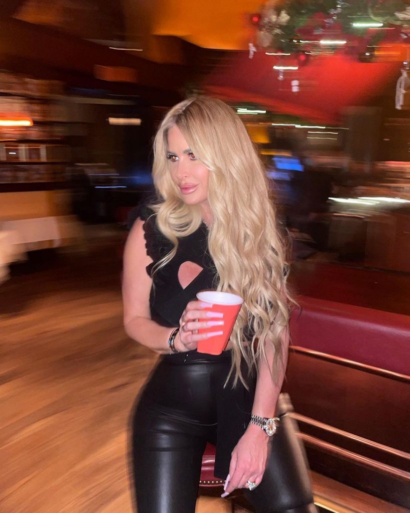 Kim Zolciak with a red solo cup