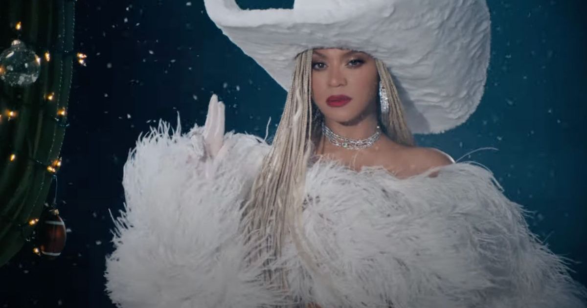 Beyoncé Looks Winter Ready in Furry Top & Coat for Christmas Halftime Show