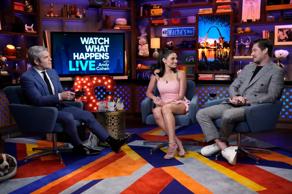 Andy Cohen sitting with Paige DeSorbo and Craig Conover on Watch What Happens Live