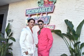 Tom Sandoval and Tom Schwartz posing in front of Schwartz & Sandy's