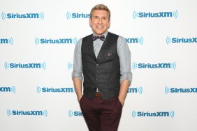 Todd Chrisley in a bow tie posing at SiriusXM studios