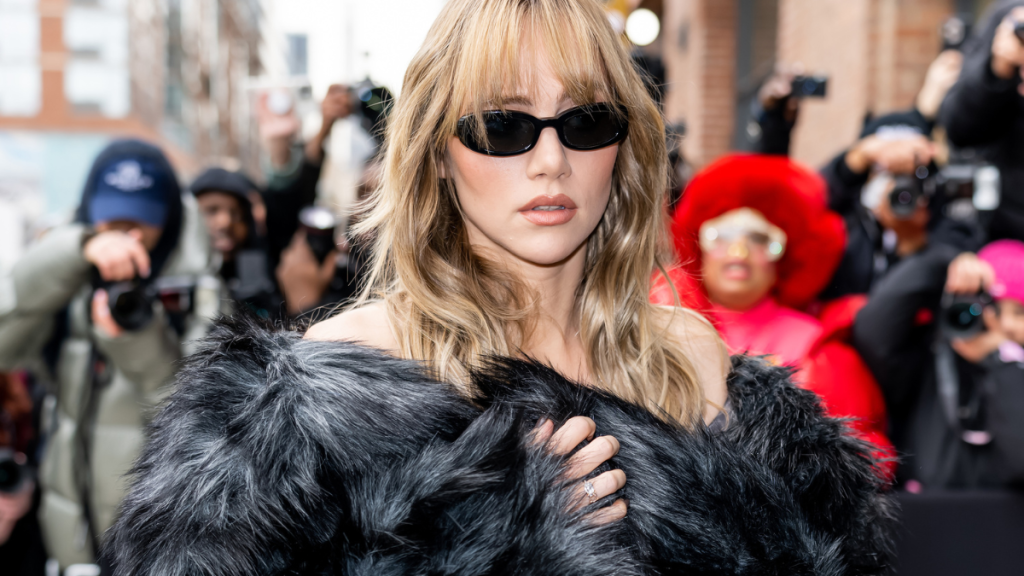 Singer-songwriter and actress Suki Waterhouse arrives to the Michael Kors Collection Fall/Winter 2025 Runway Show at Terminal Warehouse on February 11, 2025 in New York City.