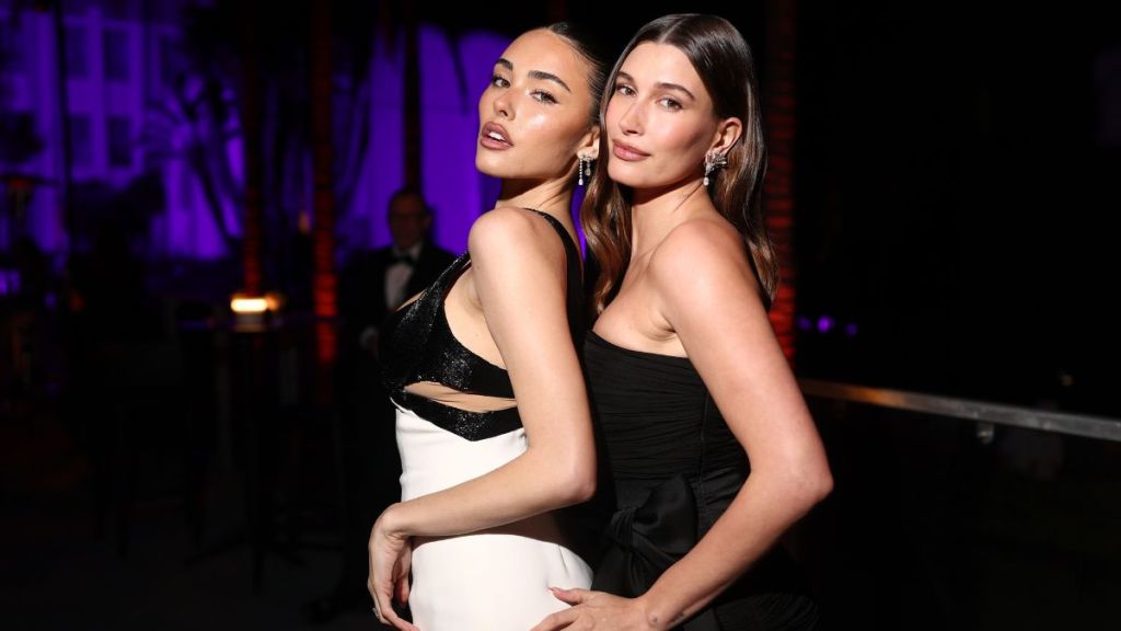 Madison Beer and Hailey Bieber attend the 2025 Vanity Fair Oscar Party Hosted By Radhika Jones at Wallis Annenberg Center for the Performing Arts on March 02, 2025 in Beverly Hills, California.