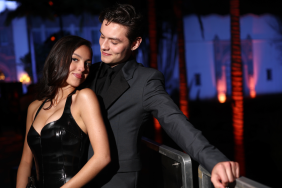 Olivia Rodrigo and Louis Partridge attends the 2025 Vanity Fair Oscar Party Hosted By Radhika Jones at Wallis Annenberg Center for the Performing Arts on March 02, 2025 in Beverly Hills, California.