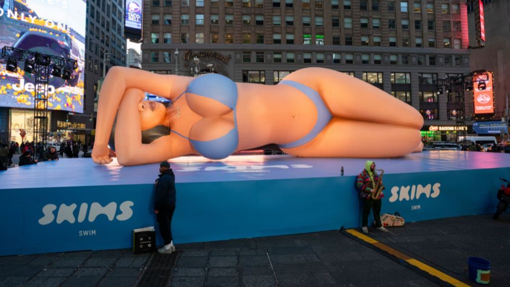 A view of a gigantic SKIMS swim inflatable 60 foot balloon resembling the likeness of Kim Kardashian at Times Square on March 04, 2025 in New York City.