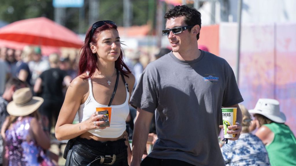 Dua Lipa and Callum Turner during day four of Glastonbury Festival 2024 at Worthy Farm, Pilton on June 29, 2024 in Glastonbury, England.