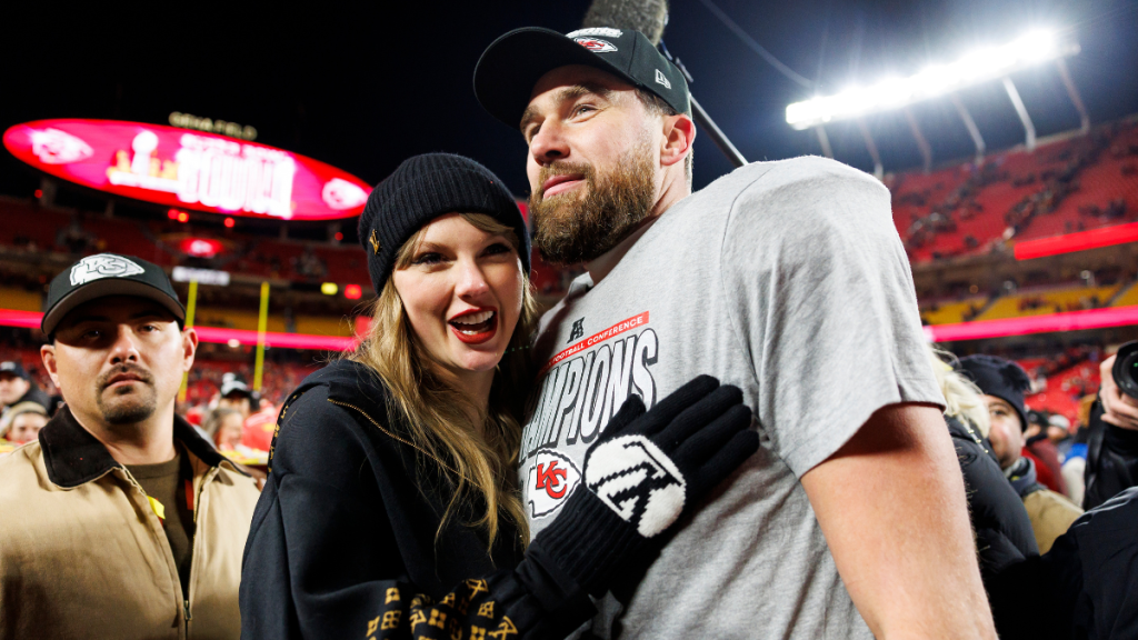 Tight end Travis Kelce #87 of the Kansas City Chiefs celebrates with Taylor Swift after the AFC Championship football game against the Buffalo Bills, at GEHA Field at Arrowhead Stadium on January 26, 2025 in Kansas City, Missouri.