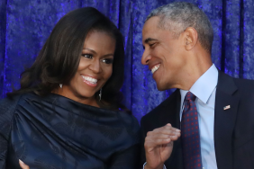 Former U.S. President Barack Obama and first lady Michelle Obama participate in the unveiling of their official portraits during a ceremony at the Smithsonian's National Portrait Gallery, on February 12, 2018 in Washington, DC.